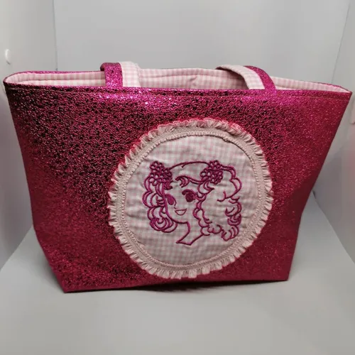 Petit sac fillette minouche au motif de candy rétro simili fushia brillant